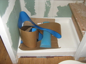 Self adhesive water proof membrane shower stall prep for tile