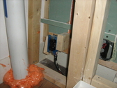 patching holes from electrical electrican MEP work fireproofing foam taping and spackling shower and tub caulk recycling construction material recycling job site wastes GREEN building