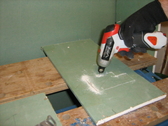 patching holes from electrical electrican MEP work fireproofing foam taping and spackling shower and tub caulk recycling construction material recycling job site wastes GREEN building
