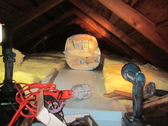 Superinsulation attic retrofit completed 20 inches fiberglass batt R60 average