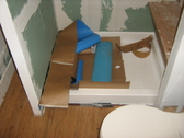 Self adhesive water proof membrane shower stall prep for tile