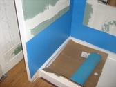 Self adhesive water proof membrane shower stall prep for tile