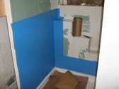 Self adhesive water proof membrane shower stall prep for tile
